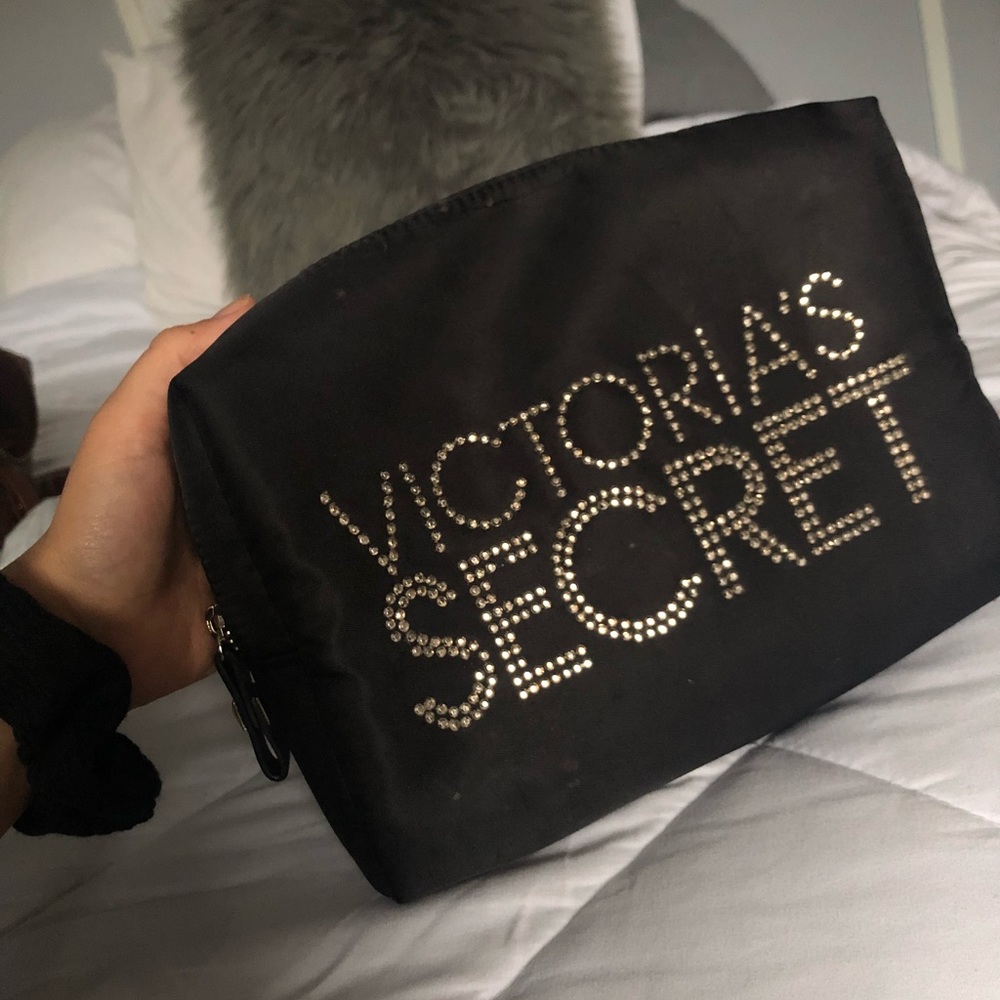 Black Victoria’s Secret makeup bag cheetah inside